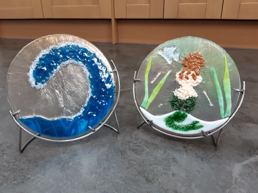 wave and mermaid glass circles on stands